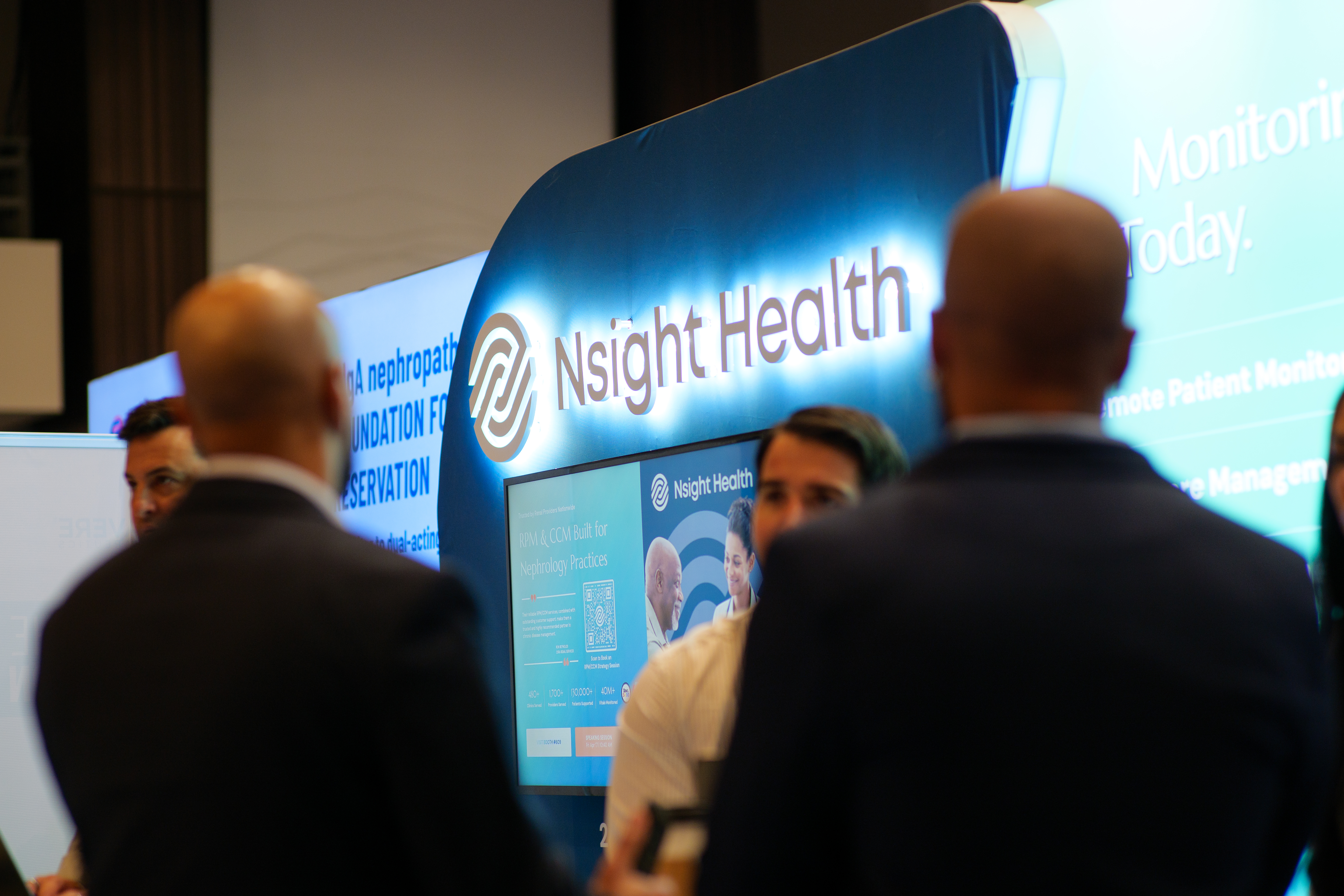 Nsight Health booth at RPA 2026 with attendees and lit signage